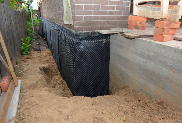 Happy homeowners after waterproofing job in Palisades Park